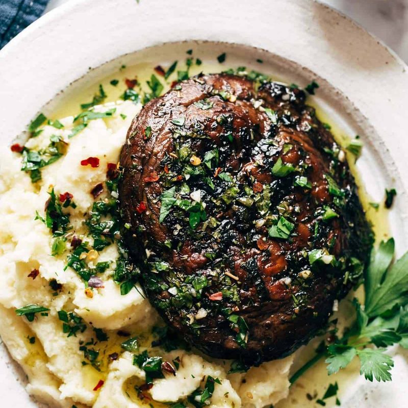 A picture of Grilled Chimichurri Portobellos with Goat Cheese Mashed Potatoes