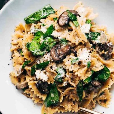 Mushroom Pasta with goat cheese in a bowl.