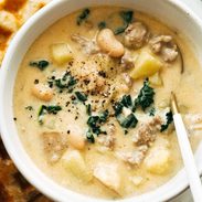 Sausage and white bean soup in a bowl.